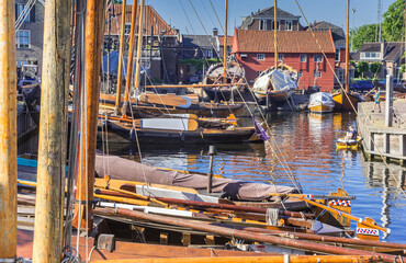Fototapeta na wymiar Wooden ships in the harbor of Spakenburg