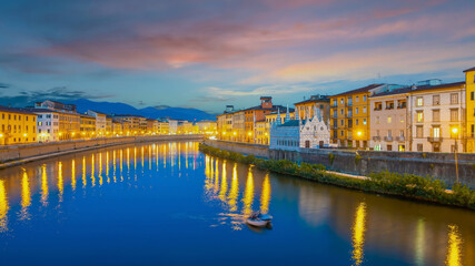 Citydscape with Pisa old town and Arno river in Italy