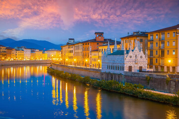 Fototapeta na wymiar Citydscape with Pisa old town and Arno river in Italy