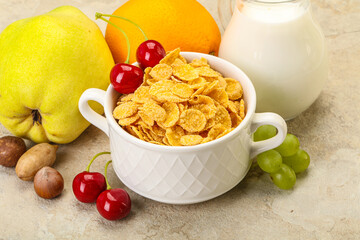 Breakfast with corn flakes and milk