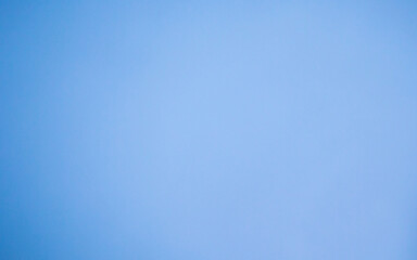Horizontal image of an empty light blue background. Light Bluish Color Abstracts and backgrounds of Glossy Plastic Paper Sheets Board design element copy space.