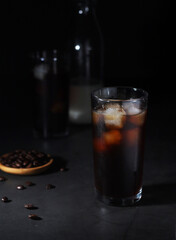 Cold coffee with ice in low key	