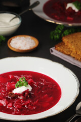 A plate with Ukrainian national dish - borsch