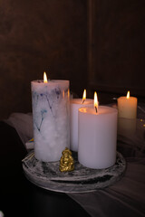 Fortune telling on tarot cards, candles for magic rituals.