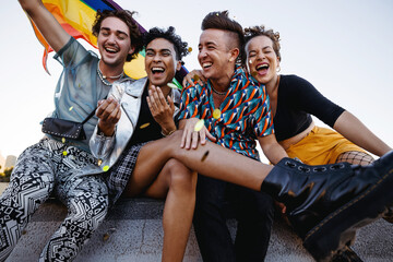 Young people celebrating gay pride outdoors - obrazy, fototapety, plakaty