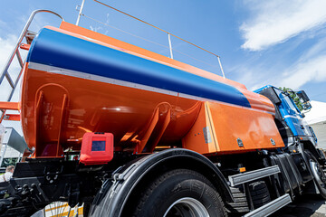 Big fuel tanker truck on the blue sky background