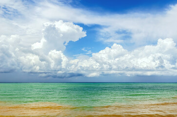 beautiful white cumulus clouds over the sea.