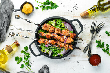 Juicy chicken skewers with rosemary and spices. Top view. Barbecue.