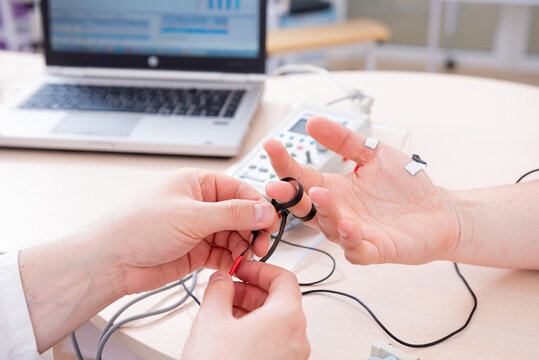Patient nerves testing using electromyography at medical center