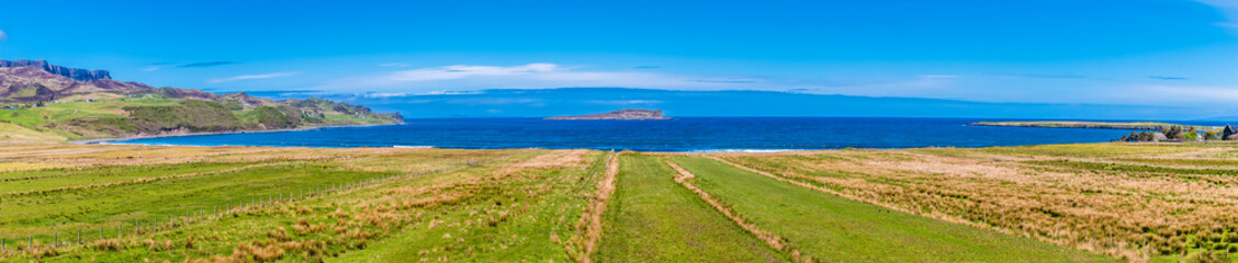 A panorama view across Staffin Bay on the Isle of Skye, Scotland on a summers day