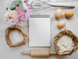 Cooking homemade bakery products. Close-up, view from above, wooden board. White, isolated...