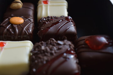 Delicious small cakes in the box