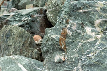 huge pile with boulders near the mountain