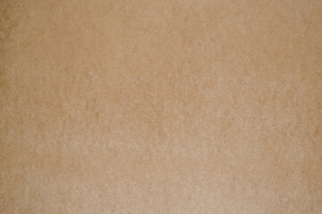 Fiberboard (MDF) surface. Recycled wood texture. Wooden surface of a fibreboard d sheet, top view. Brown hardboard texture background.