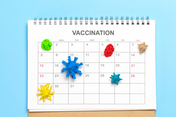 Vaccination calendar. Calendar with viruses as a reminder of vaccinations