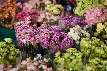 Various flowers packed in a traditional market