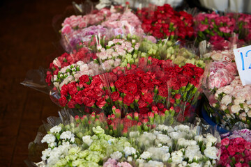Various flowers packed in a traditional market
