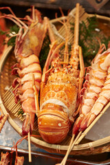 Fresh lobsters displayed in a traditional market