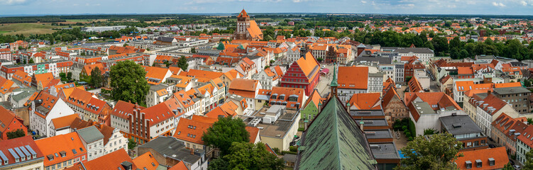 Obraz premium View on old town from belfly of St. Nikolai cathedral. University and Hanseatic City of Greifswald is a city in the state of Mecklenburg-Vorpommern, Germany.