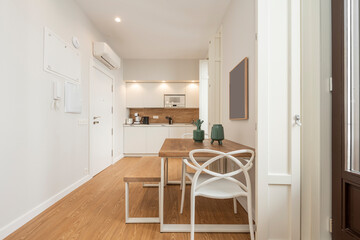 Nice decoration of office and kitchenette in a vacation rental apartment in a vintage building with large windows