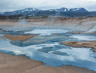 geothermal field with blue pods in Iceland