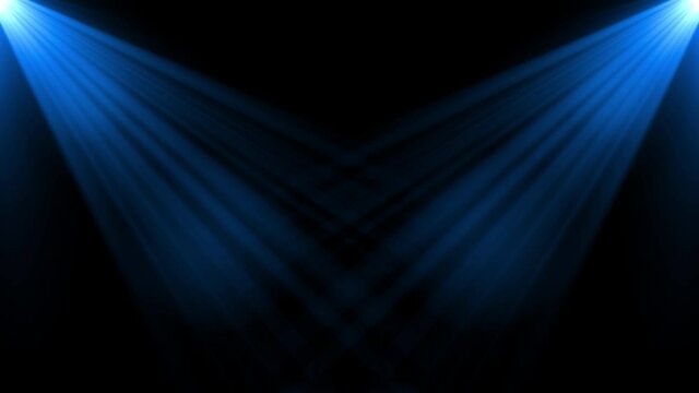 symmetrical Bright colorful spotlights shine into the scene in smoke, concert background. Seamless loop animation 4K Optical Lens Flare Effect and leaks Light and transitions. green screen.