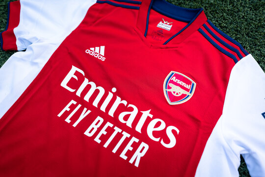 Thailand - July 2021 : Adidas present the new Arsenal team home jersey season 2021-2022. Sport equipment object, close-up and selective focus.