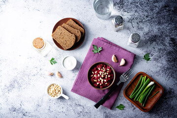 Fototapeta na wymiar Beetroot salad with pine nuts in a bowl