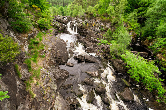 The Rogie Falls, a series of waterfalls near the village of Contin, Ross-Shire, Scotland, UK, viewed here from the suspension bridge.