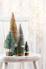 Christmas tree on bohek wooden, bokeh background.