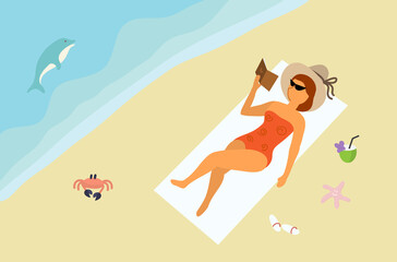 Girl in a swimsuit, glasses and a hat is sunbathing on sandy beach