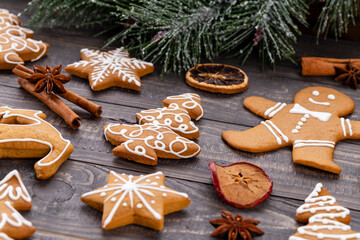 Homemade christmas gingerbread cookies on wooden table.