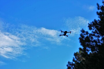 Fototapeta na wymiar Drone flying in the sky