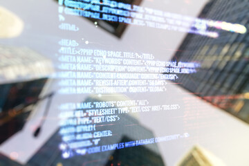 Double exposure of abstract creative programming illustration on blurry cityscape background, big data and blockchain concept