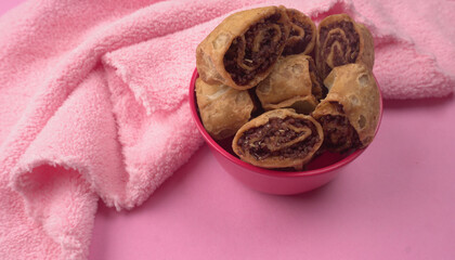 Indian traditional Snacks Bhakarvadi or Bakarvadi. Diwali snacks Bhakarwadi, selective focus.