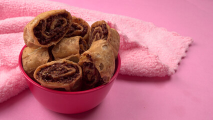 Indian traditional Snacks Bhakarvadi or Bakarvadi. Diwali snacks Bhakarwadi, selective focus.