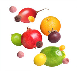 Different tasty exotic fruits flying on white background