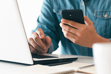 Work using mobile phone typing computer mobile chat laptop contact us at workplaces, planning ideas investors internet searching, ideas connecting people.