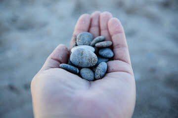 Stones on the hand, beach, vacation