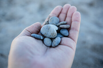 Stones on the hand, beach, vacation
