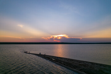 Obraz premium Aerial view of the sunset over the estuary