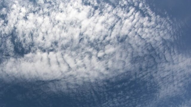 Thin cirrus clouds in the blue sky, time-lapse. Cloudy sky video.

