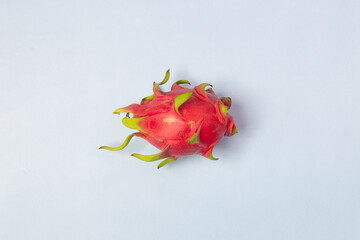 fresh dragon fruit on a blue background