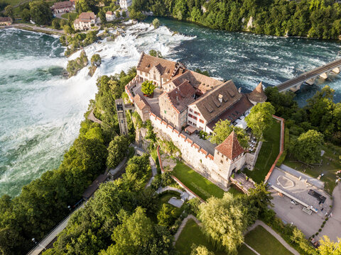 Aerial image with drone over the Rhine Falls and Castle Laufen in Switzerland - the largest waterfall in Europe
