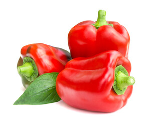 Ripe red sweet bell peppers isolated on white background. Fresh vegetables.