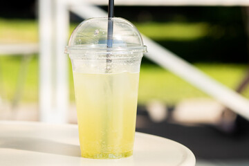 summer drink refreshing lemonade on the table in a beach cafe