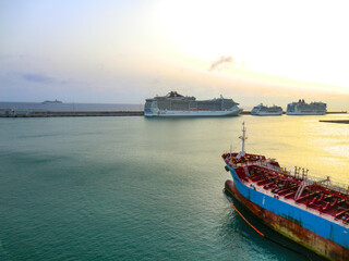 Luxury cruise ship sailing in Civitavecchia port at sundown, Lazio, Rome, Italy, Europe