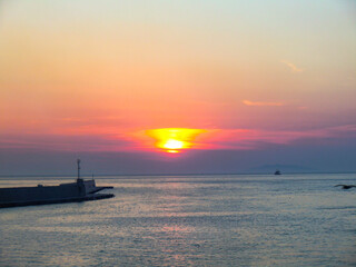 Obraz premium cruise ship arriving to Civitavecchia port at sundown, Lazio, Rome, Italy, Europe