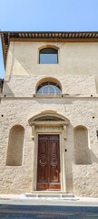 Fototapeta na wymiar Ancient house in San Gimignano in Tuscany
