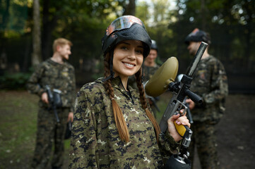 Soldiers playing paintball, war in the forest - obrazy, fototapety, plakaty